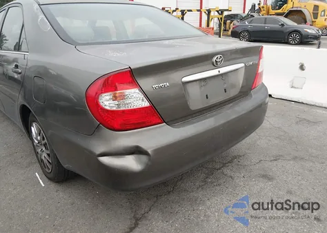 2002 Toyota Camry Le from USA, damaged, VIN JTDBE32K520097841